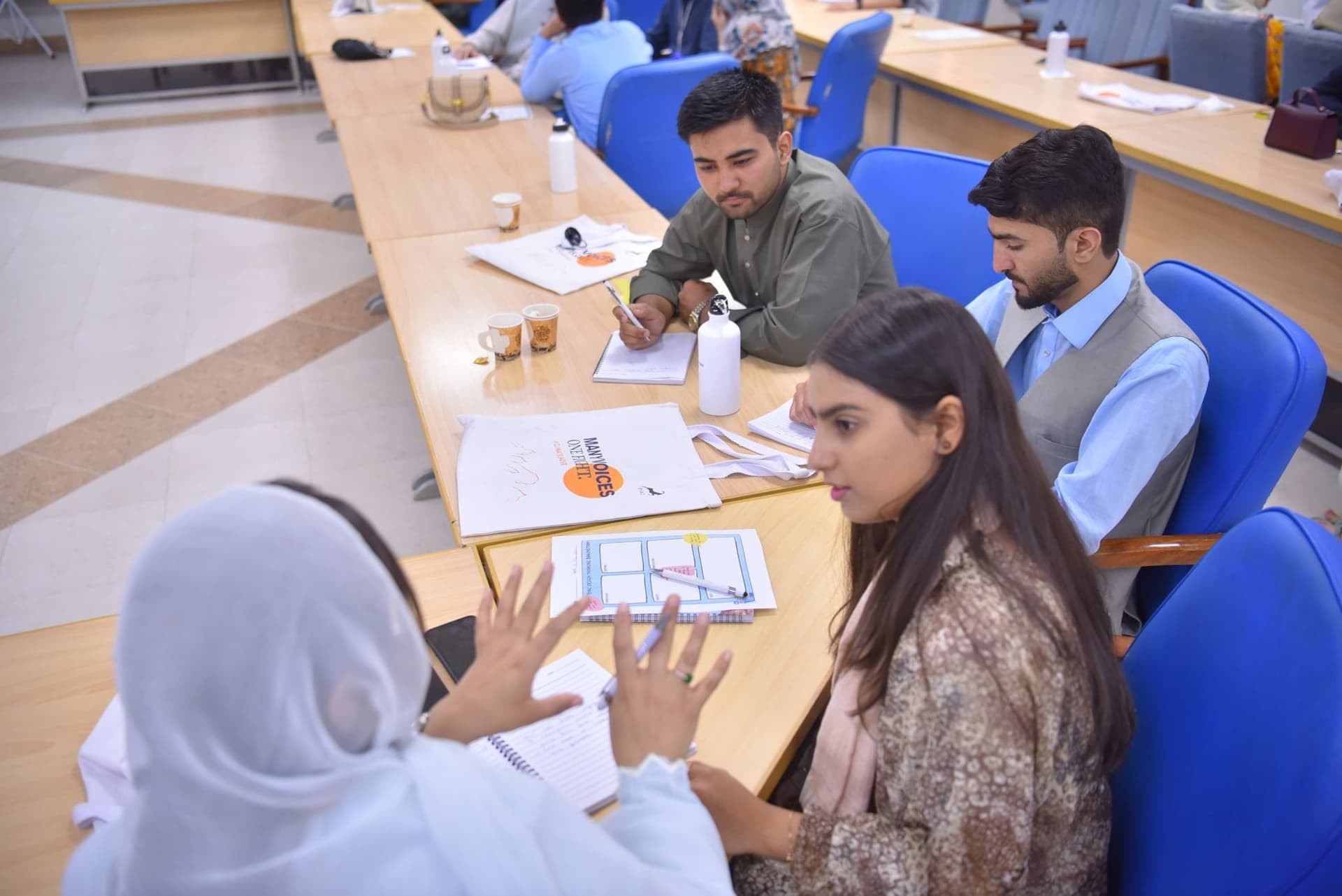 Lalain in a small group discussion at the Building Climate Leaders Summit